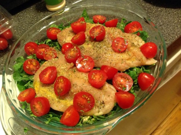 Raw chicken and kale tomatoes